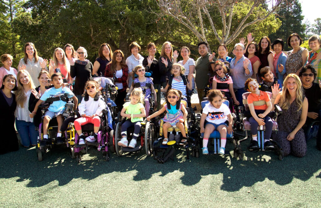 A group photo of the students and staff at the Bridge School