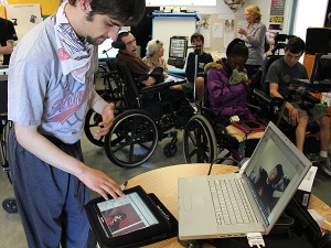 Max, a new member of the crew, introduces himself to Thanh who joined the group via video chat.