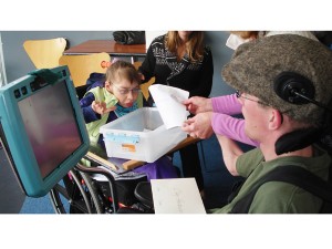 Clay turns in his pledge sheet to Annie.